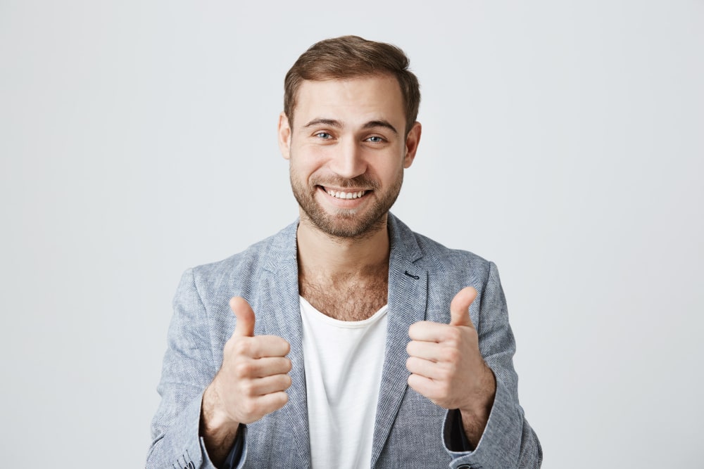Man show thumb emoji